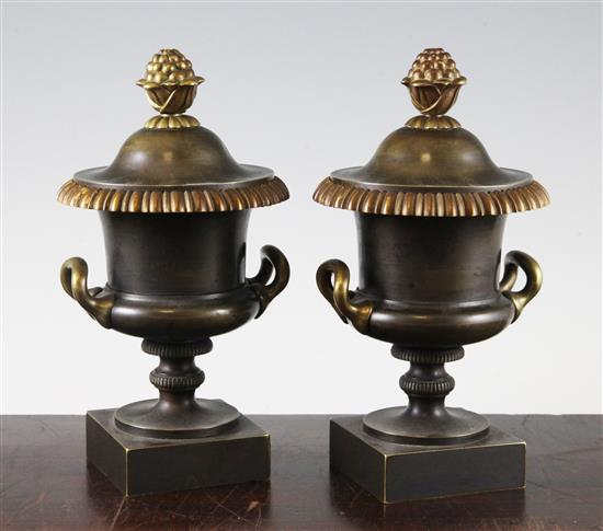 A pair of early 20th century French bronze cassolettes, 8in.